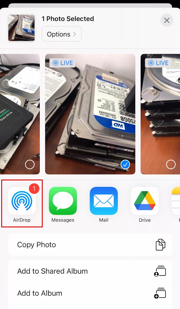 iPhone: seleccione AirDrop en el menú Compartir iPhone: seleccione AirDrop en el menú Compartir